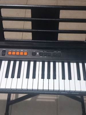 Casio keyboard with stand new