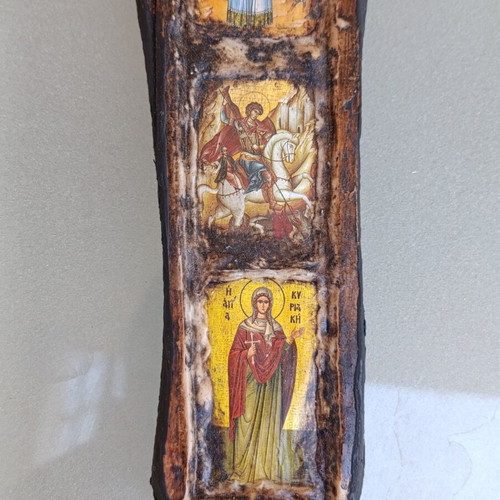 Wooden cross decorated with icons
