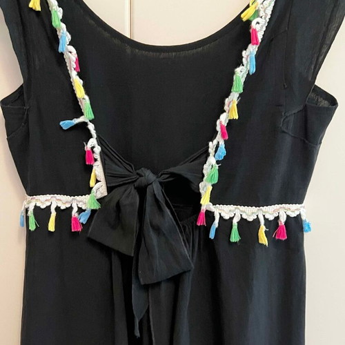Dress with open back and bow used, black with colorful tassels
