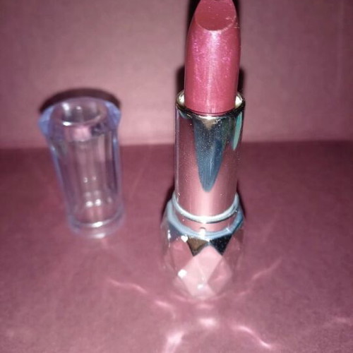 Purple lipstick shiny new with subtle glitter