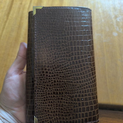 Long vintage brown leather wallet with crocodile pattern and metal corners