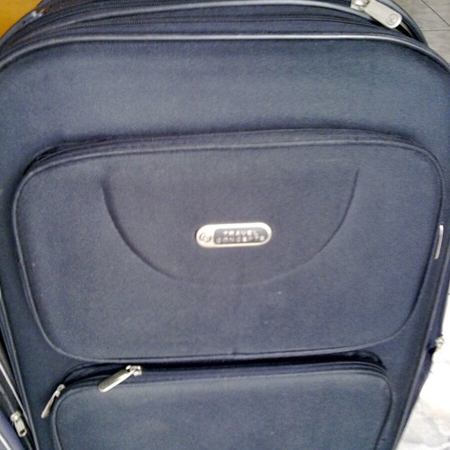 Wheeled travel suitcases, black and grey, like new