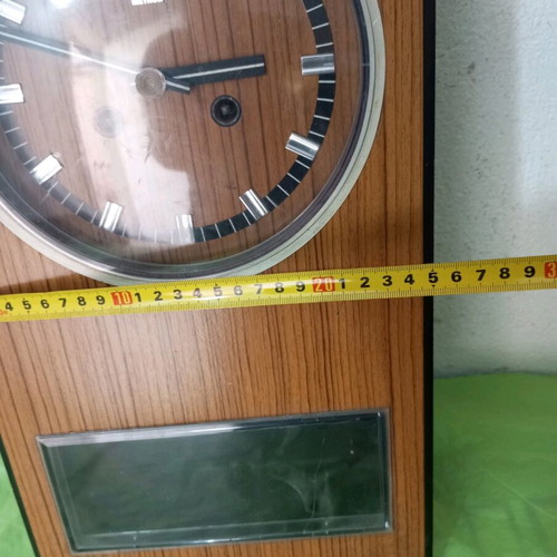 Wooden wall clock used, dimensions 45x25 cm