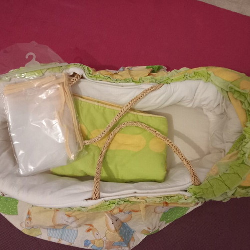Bassinet used with mattress, mosquito net, and small quilt