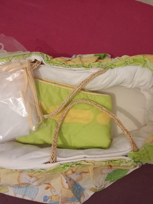 Bassinet used with mattress, mosquito net, and small quilt