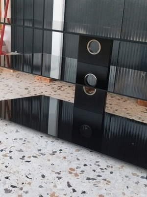 Optibase glass TV stand