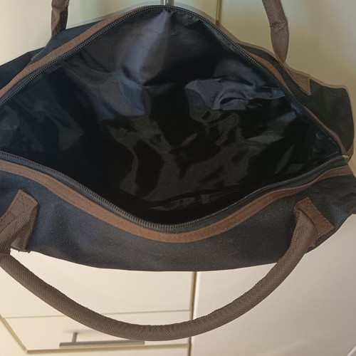 Laptop bag new, black with brown handles and zipper compartments