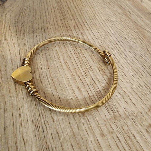 Gold toned stainless steel twisted cable wire cuff bracelet like new