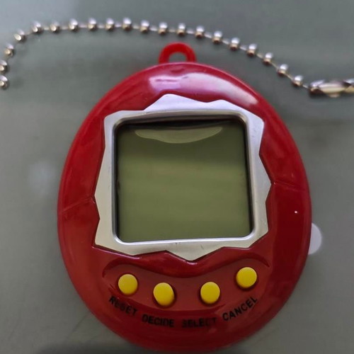 Retro digital virtual pet with chain, like new