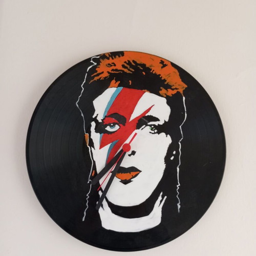 Wall clock made from vinyl record used with Ziggy Stardust sticker