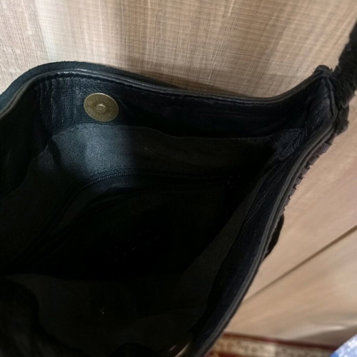 Women's leather crossbody bag with fringes nearly unused black