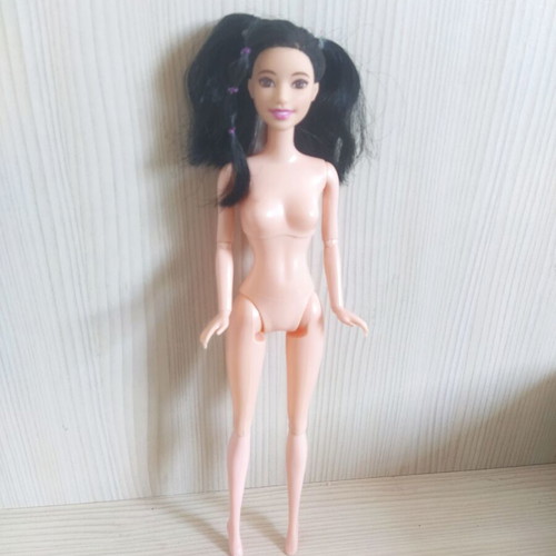 Barbie doll Asian with facesculpt Olivia and articulated body