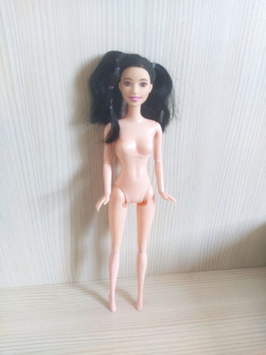 Barbie doll Asian with facesculpt Olivia and articulated body