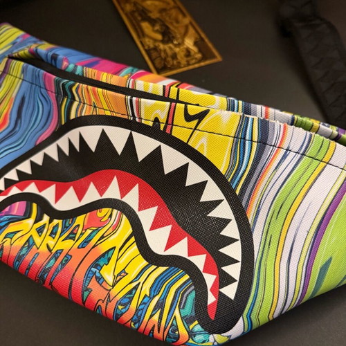 Sprayground Melt Graffiti crossbody bag like new, multicolor