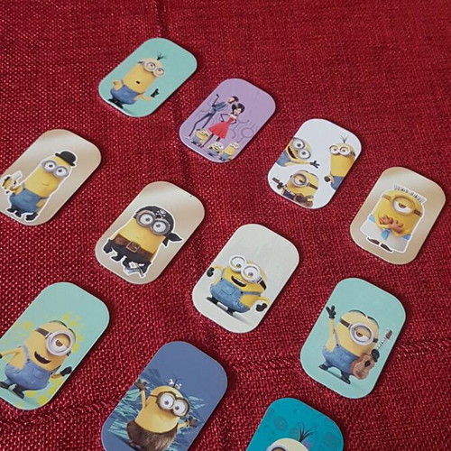 Minions metal tags like new, pack of 11 with rare GOLD tag