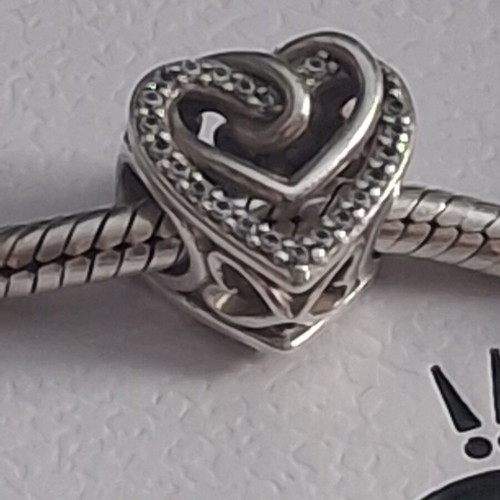 Pandora charm heart with linked hearts decorated with zircon stones, like new