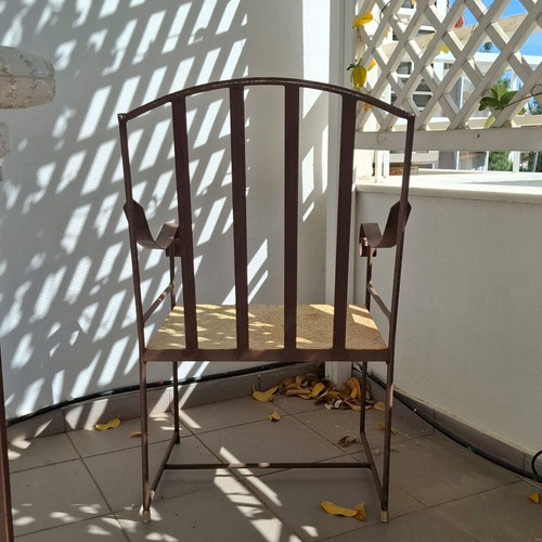 Retro wrought iron garden armchair with cushions used
