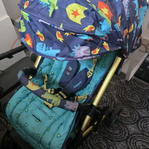 Cossato Dinosaur baby stroller used with rain cover