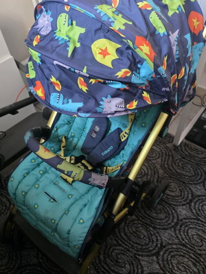 Cossato Dinosaur baby stroller used with rain cover