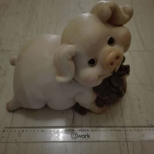 Piggy bank vintage used with gold coins