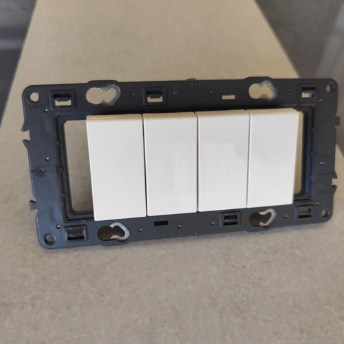 Legrand outdoor wall case with 4 relay toggle switches like new