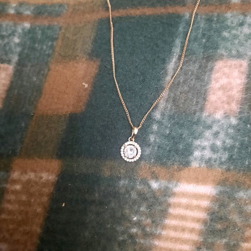 Pendant used in gold tone with stone made of steel
