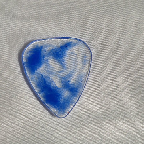Blue guitar pick made of resin new