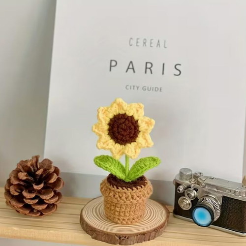 Handmade crocheted sunflower in pot