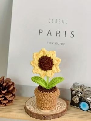 Handmade crocheted sunflower in pot