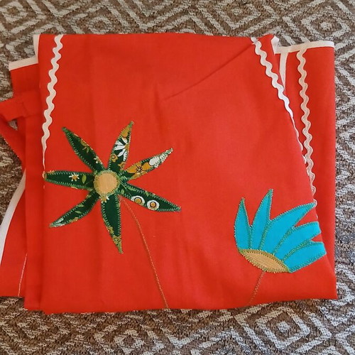 Vintage German kitchen apron 1960s, deadstock, red with floral appliqué