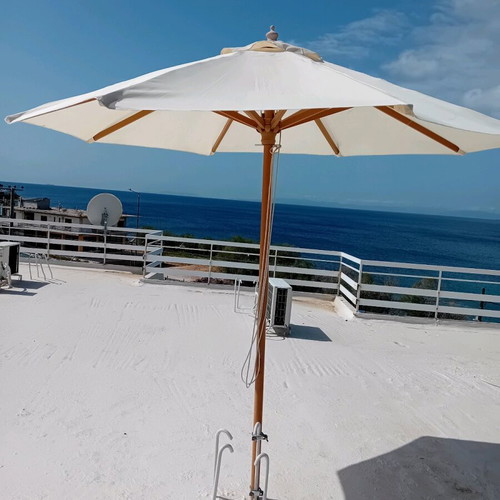 Garden veranda umbrella like new with new fabric