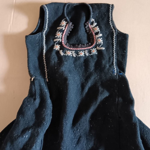 Collectible traditional wool dress of the era used