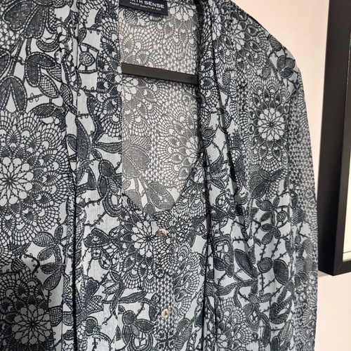 Vintage women's shirt with black and white patterns like new