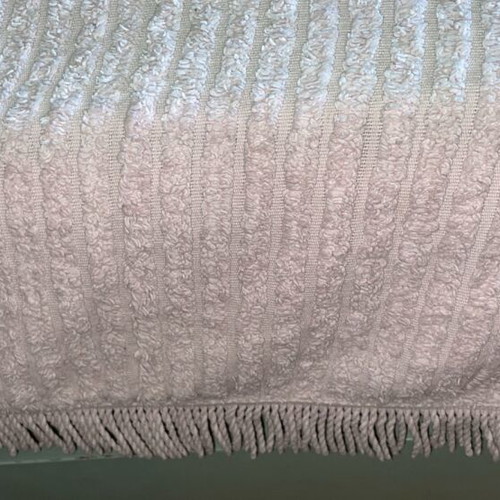 Cotton quilt for large bed, pale pink, striped with fringes