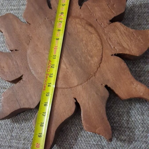 Carved wooden sun wall decor like new