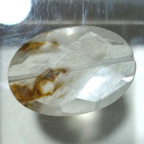 Mineral quartz with included oxides like new