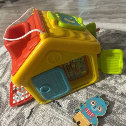 Educational Mobility Toy like new with wooden cat