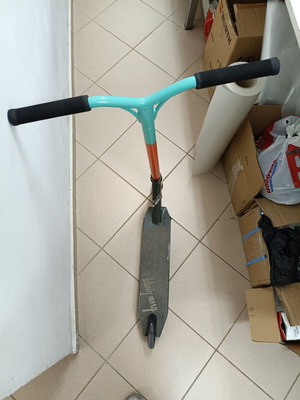 BMX stunt scooter used with scratched bottom