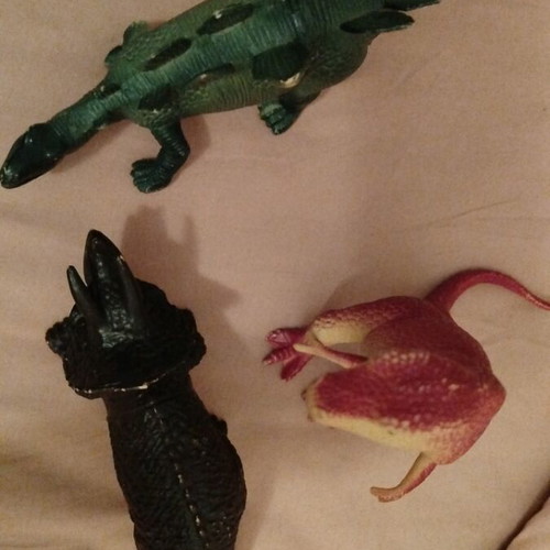 Dinosaur figures like new with sound valve in belly