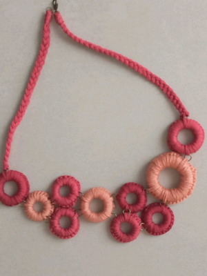Benetton fabric necklace like new with original design