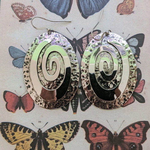 Silver spiral earrings used