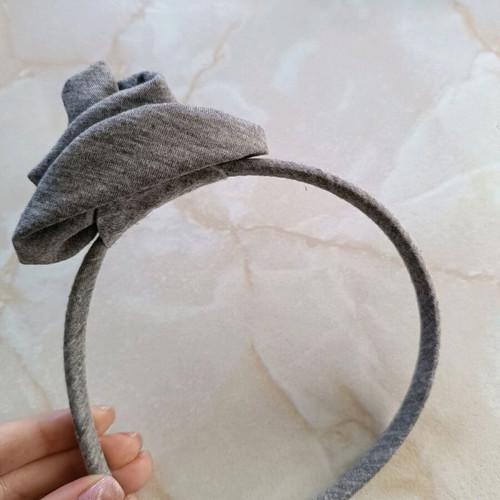Hairband like new, grey with flower design