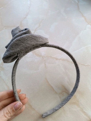 Hairband like new, grey with flower design