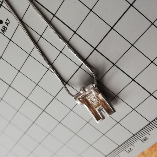 Pendant made of 925 silver and 585 gold used