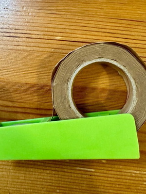 Papier-mâché tape holder used