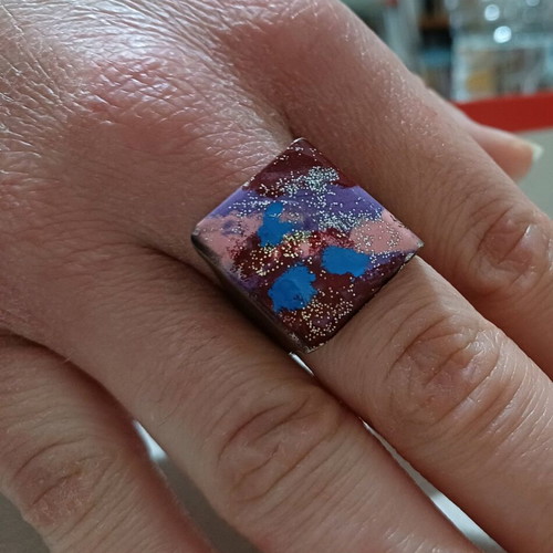 Ring like new painted with colors and glitter