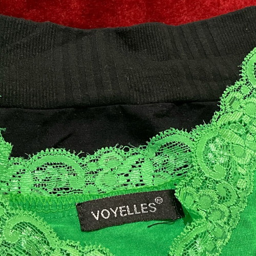 Women's set of 2 pieces used, black BSB skirt and green Voyelles lace top