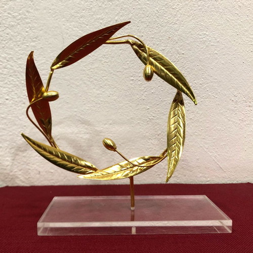 Handmade decorative wreath used on plexiglass base