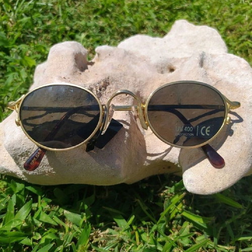 Vintage 90s sunglasses with small gold metal frame, UV 400 protection