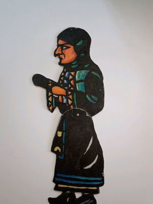 Shadow theatre figure old woman used, carved cardboard, painted